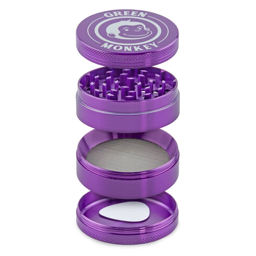A close-up, angled view of the Capuchin 63mm Grinder, showcasing its disassembled, multi-tiered purple metallic construction.