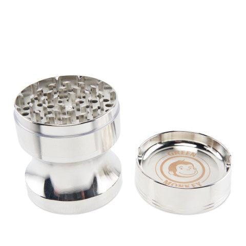 A close-up, top-down view of the silver Chacma 63mm Magnetic Grinder with Ashtray, showcasing its multi-part cylindrical design.