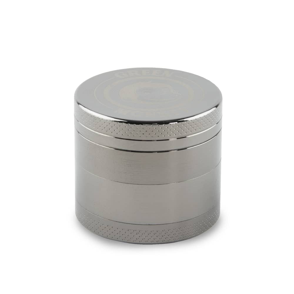A straightforward studio shot of the Capuchin 40mm Grinder, showcasing its metallic finish and cylindrical shape.