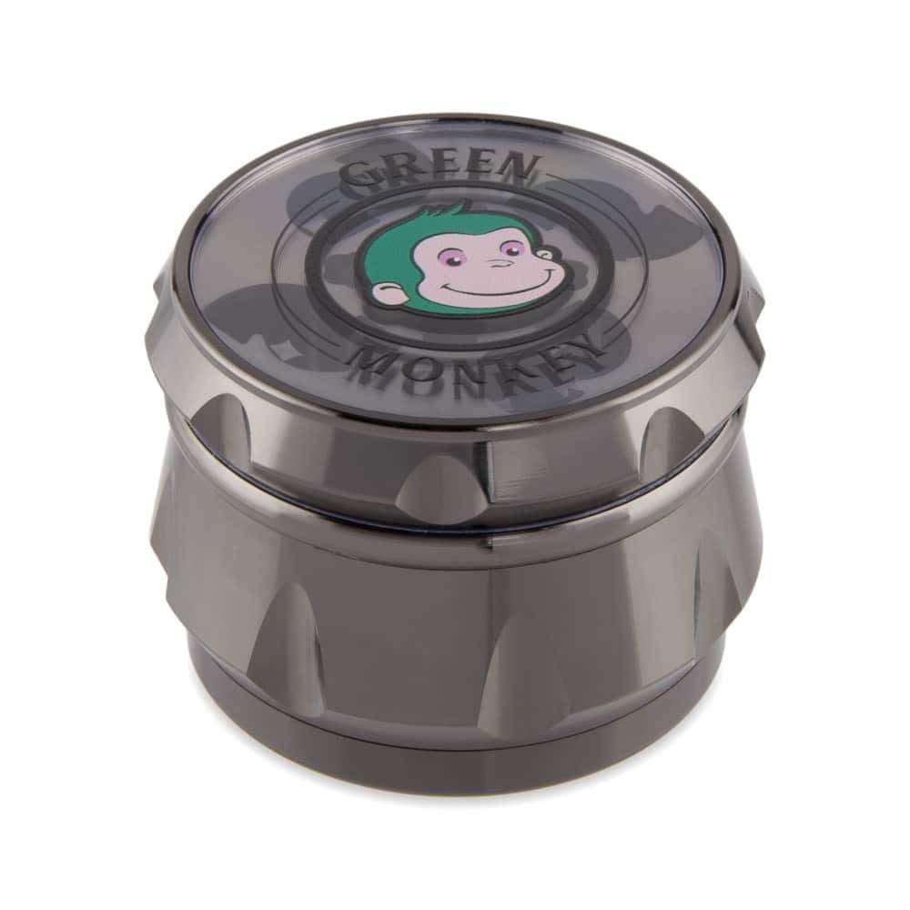 A close-up of the Baboon Crown 63mm Grinder, showcasing its metallic finish and circular design.