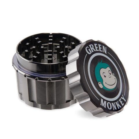 A slightly angled view of the Javan 63mm Magnetic Herb Grinder, showing its multi-part metallic construction and magnetic closure.
