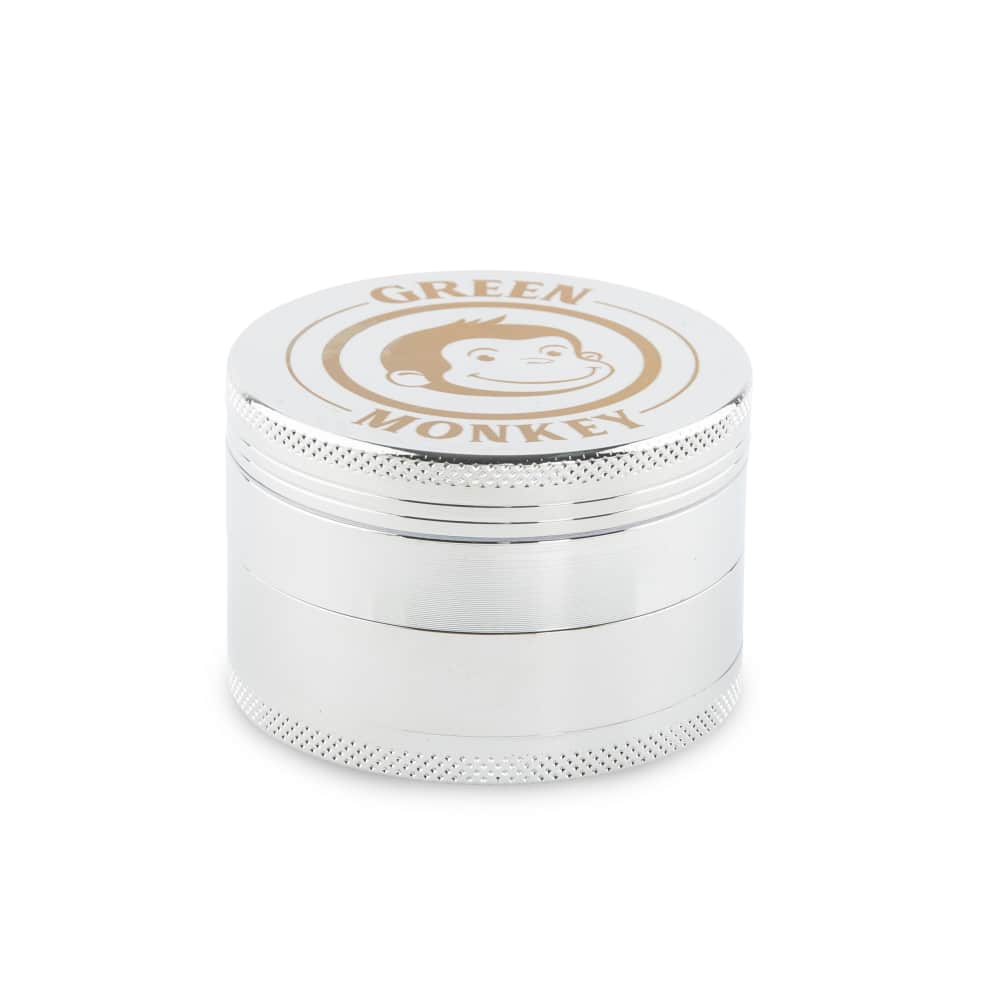 Front view of the Capuchin 63mm Grinder, a silver metal grinder with a cylindrical shape and visible threading.