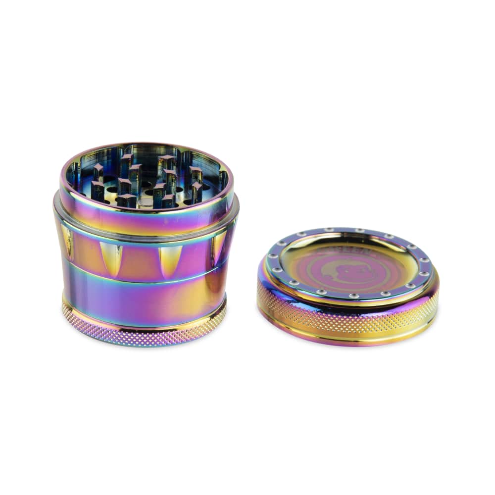 A close-up, angled view of the 50mm Tamarin Grinder, showcasing its metallic finish and multi-tiered grinding components.