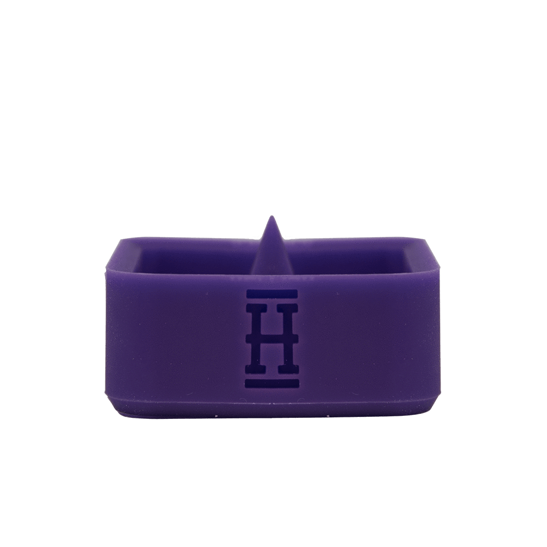 Front view of the Silicone Caché Debowling Ashtray, a dark purple bowl with a smooth, curved design.