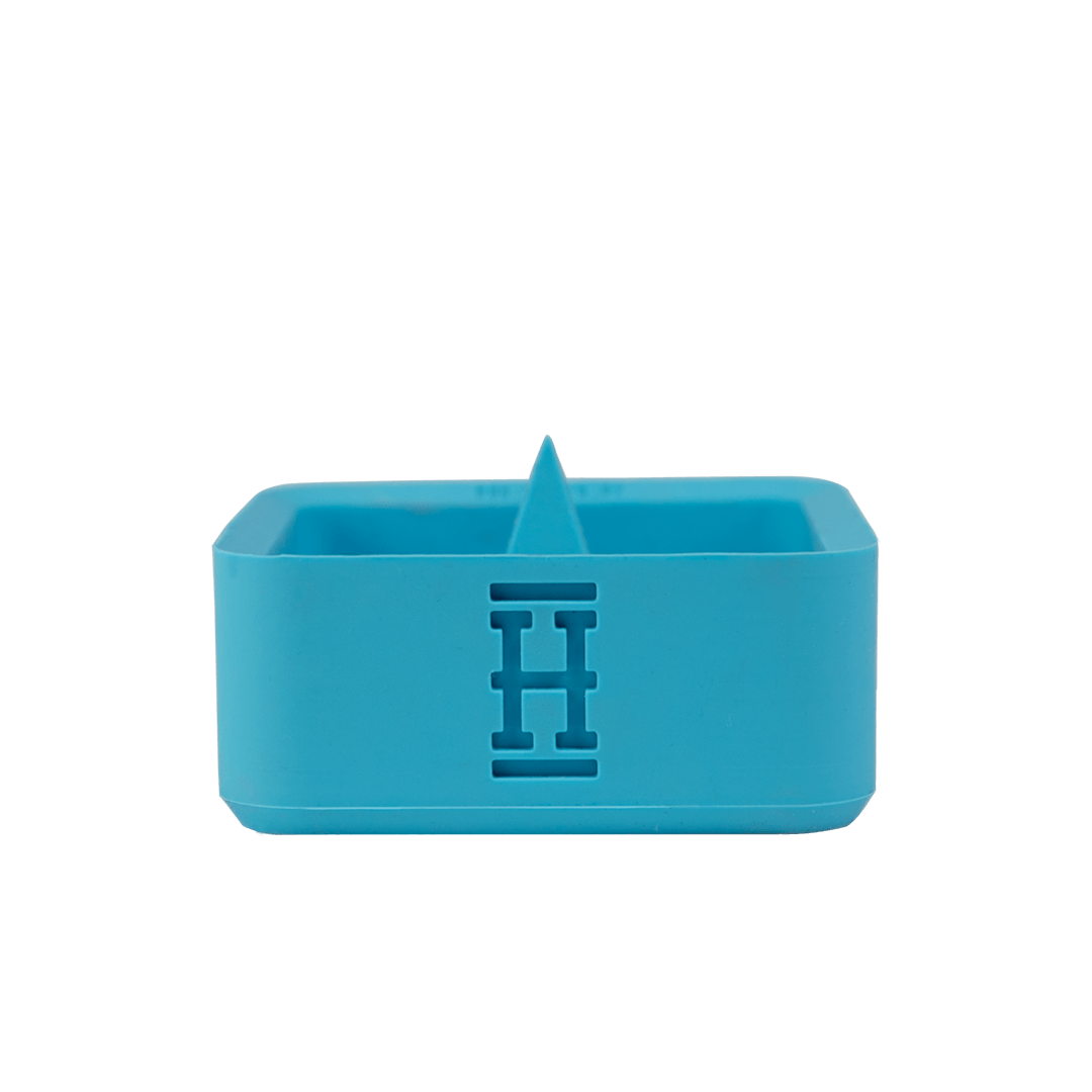 Front view of the Silicone Caché Debowling Ashtray, a sleek, bowl-shaped ashtray in a light blue hue.