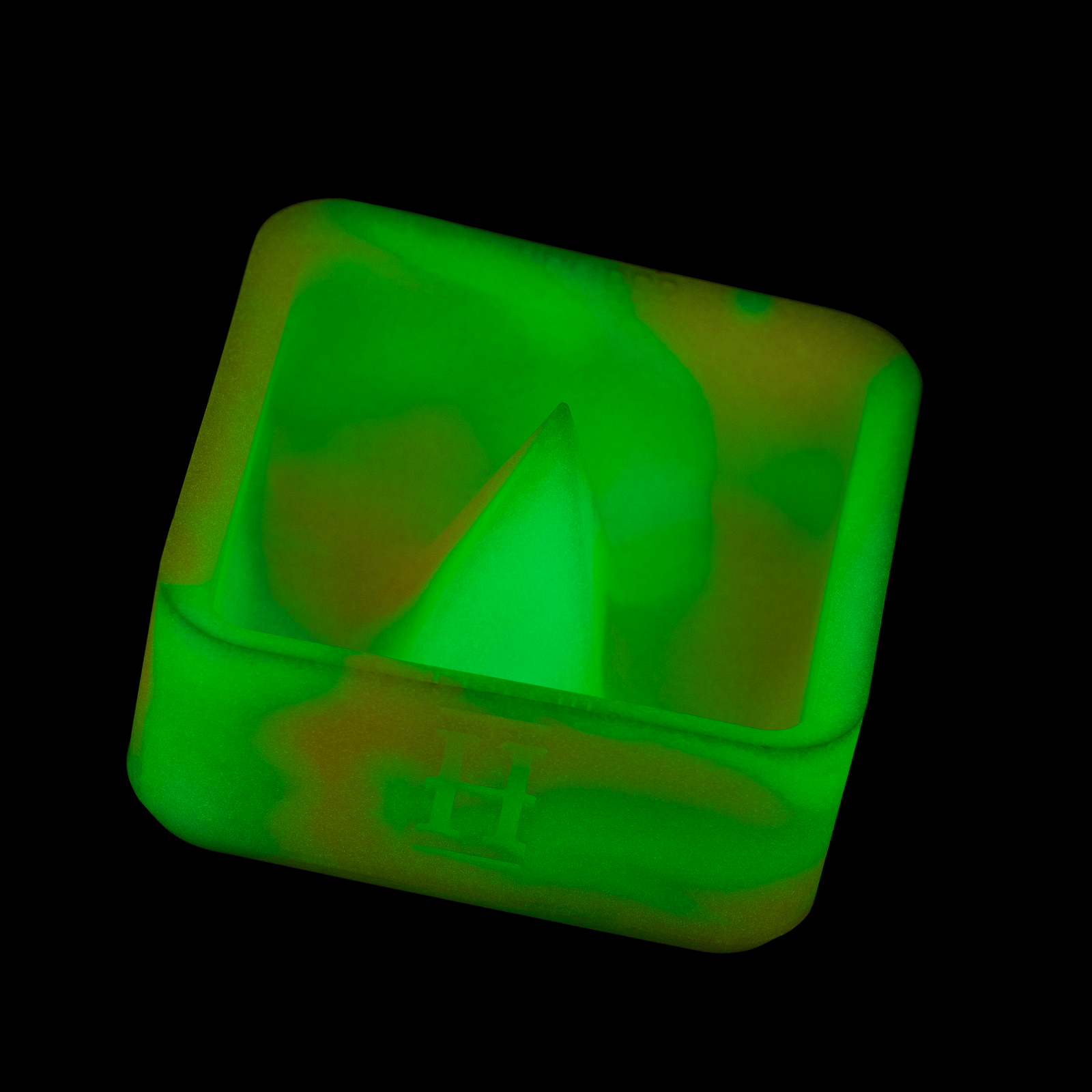 A top-down view of the Silicone Caché Debowling Ashtray, showing its smooth, curved design in a neutral tone.