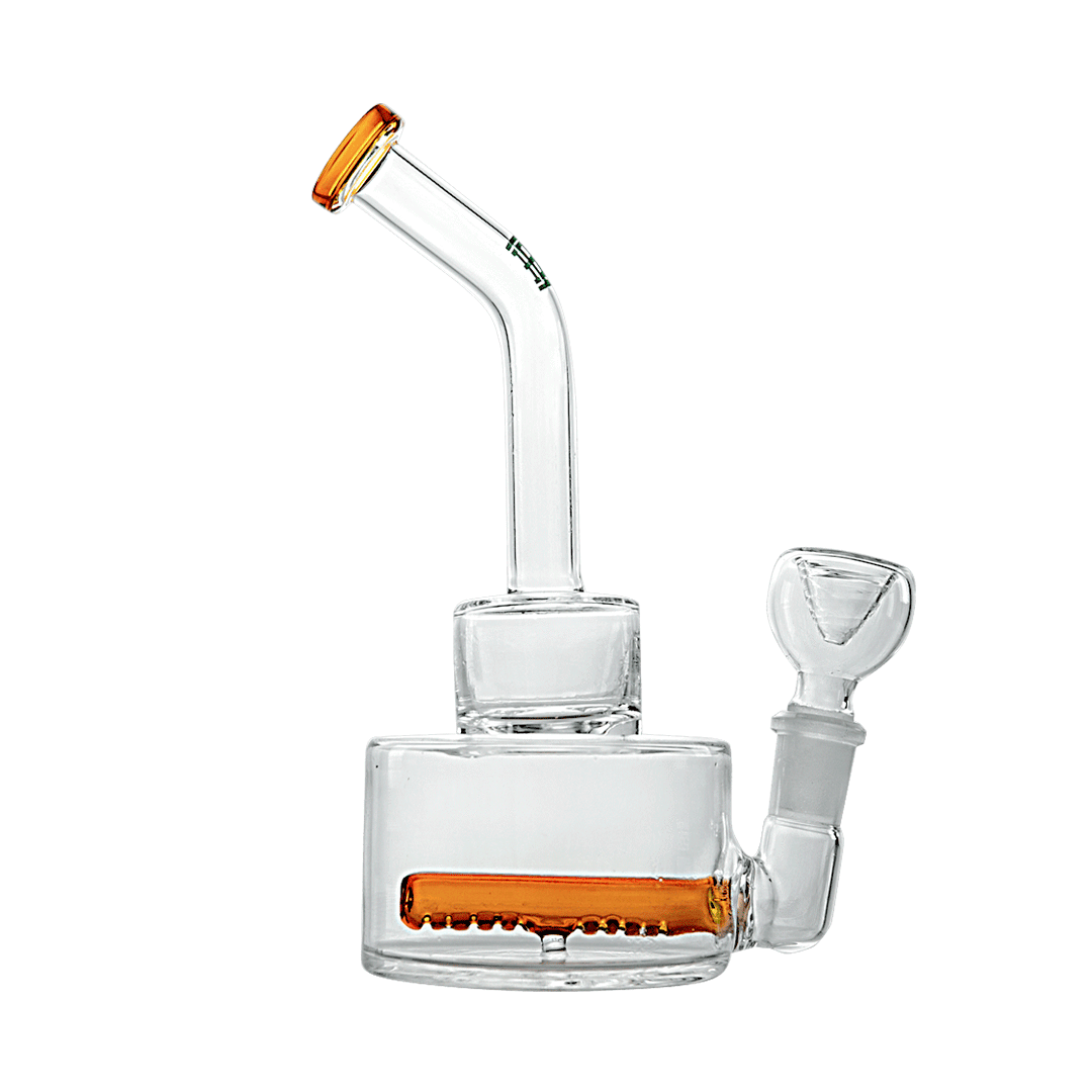 A slightly angled view of the Hemper Inline Puck Bong V2| showcasing its clear glass construction and puck-shaped body.