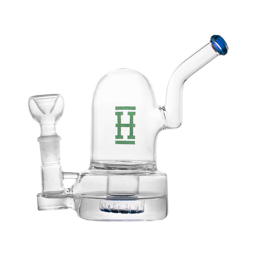 Clear studio-side view of the Hemper Bell Rig showing its domed chamber with green "H" logo, angled mouthpiece with blue rim, and percolator base.