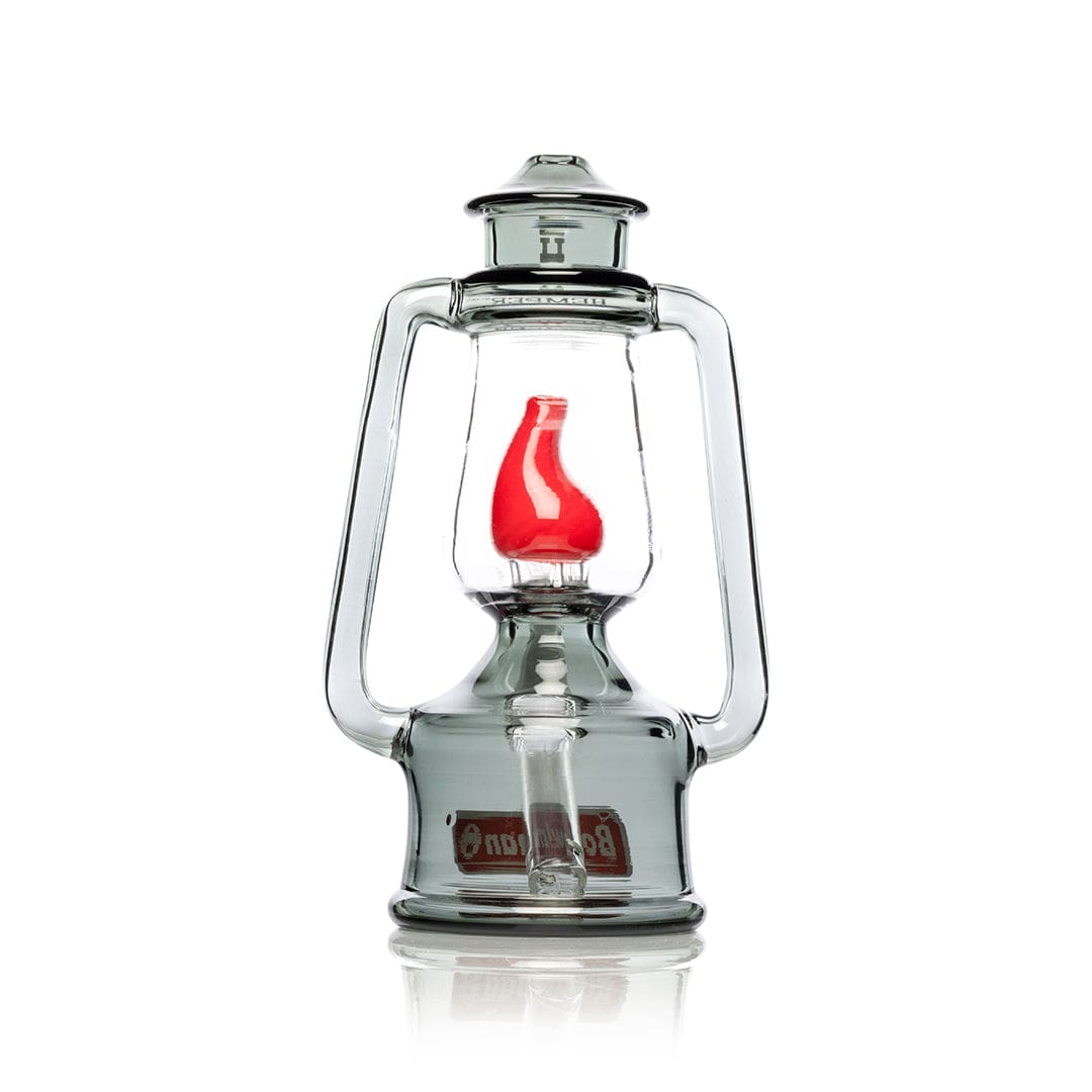 A studio shot of the 7-inch Bowlman Lantern Bong, displaying its clear glass construction and unique lantern-inspired shape.