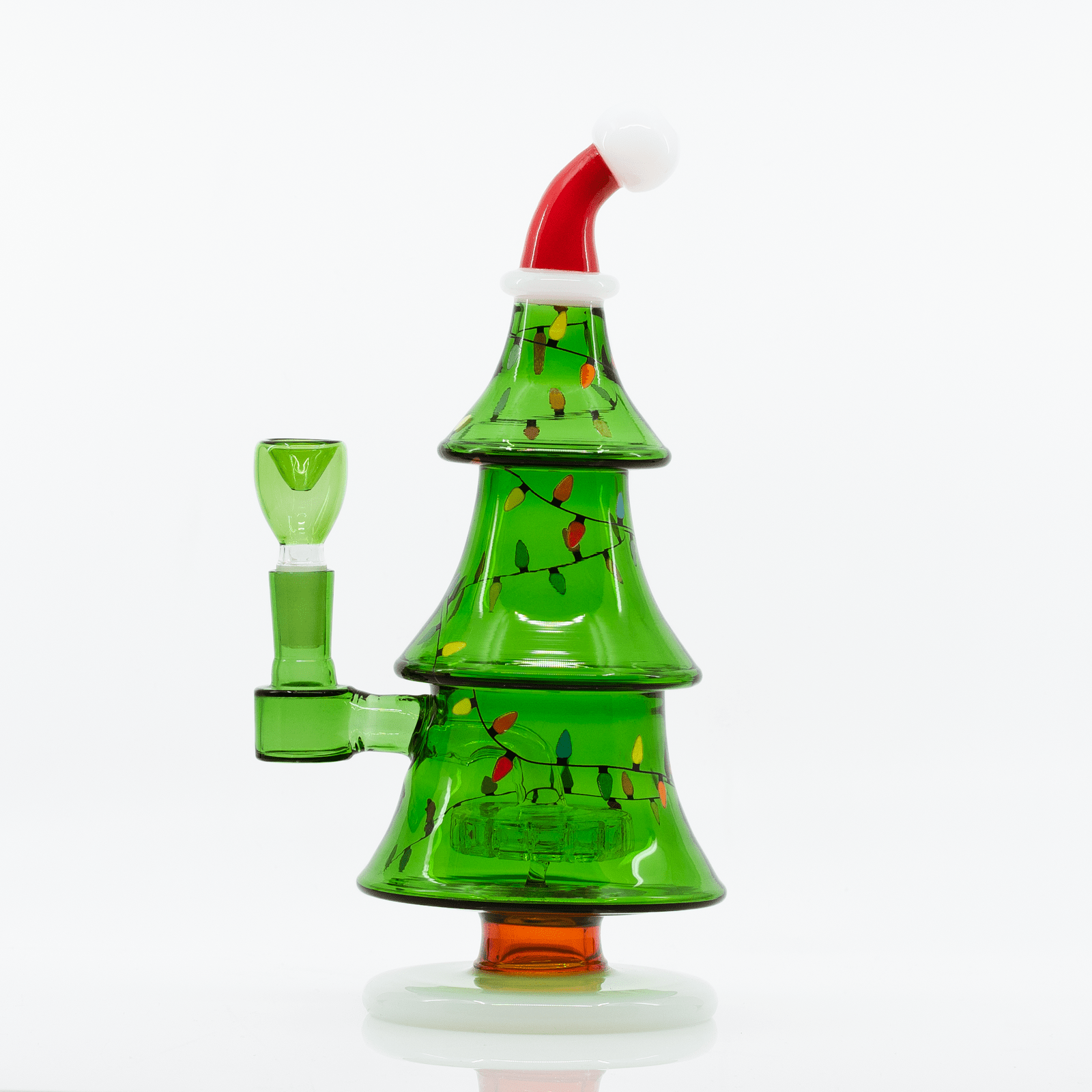Close-up front view of the Christmas Tree XL Bong showing its green glass tree tiers decorated with painted multicolored lights and a red Santa-hat top.