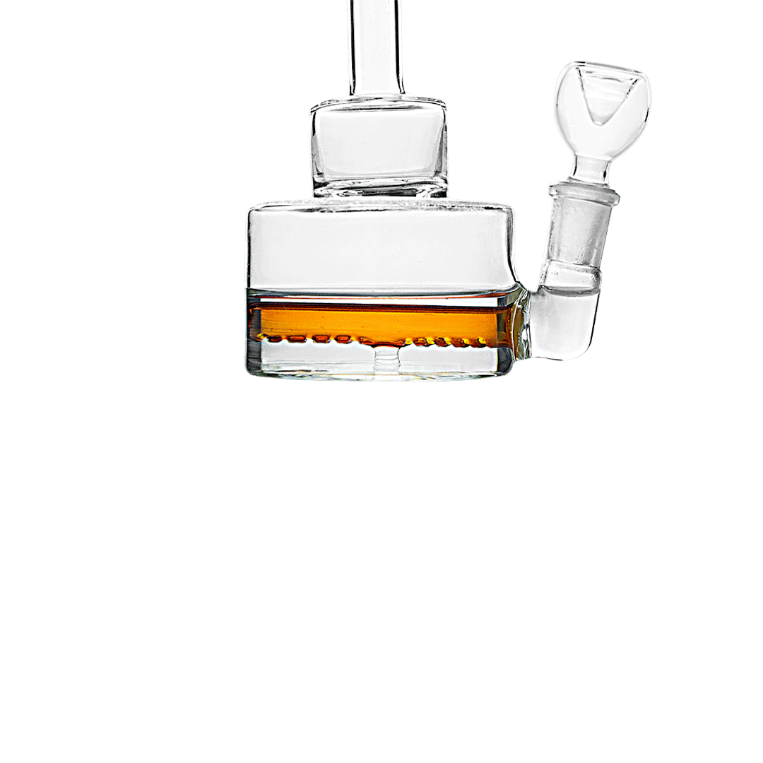 A close-up, angled view of the Hemper Inline Puck Bong V2| showing its clear glass construction and unique puck-shaped design.