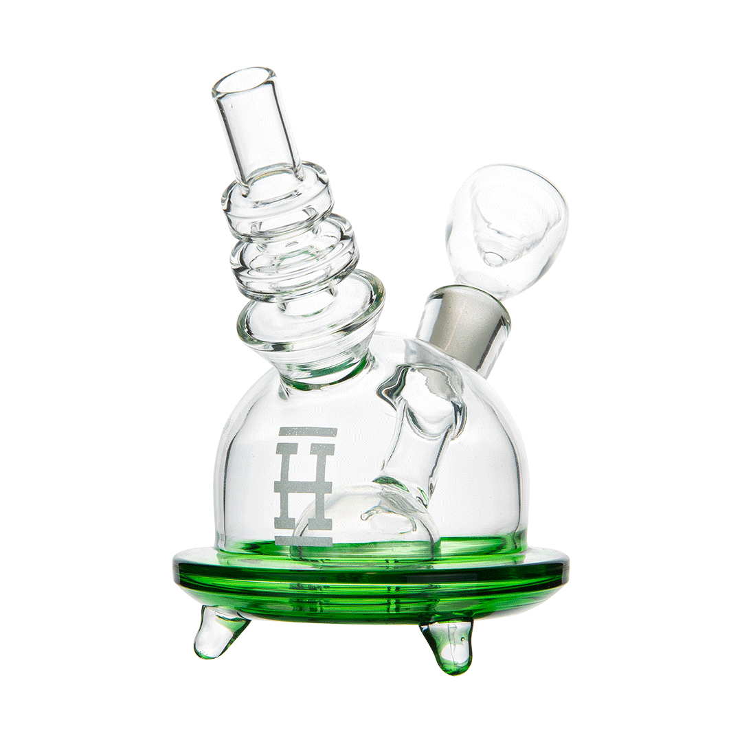 Front view of the Hemper Space Car Bong, a clear glass water pipe with a green circular base and unique stacked design.
