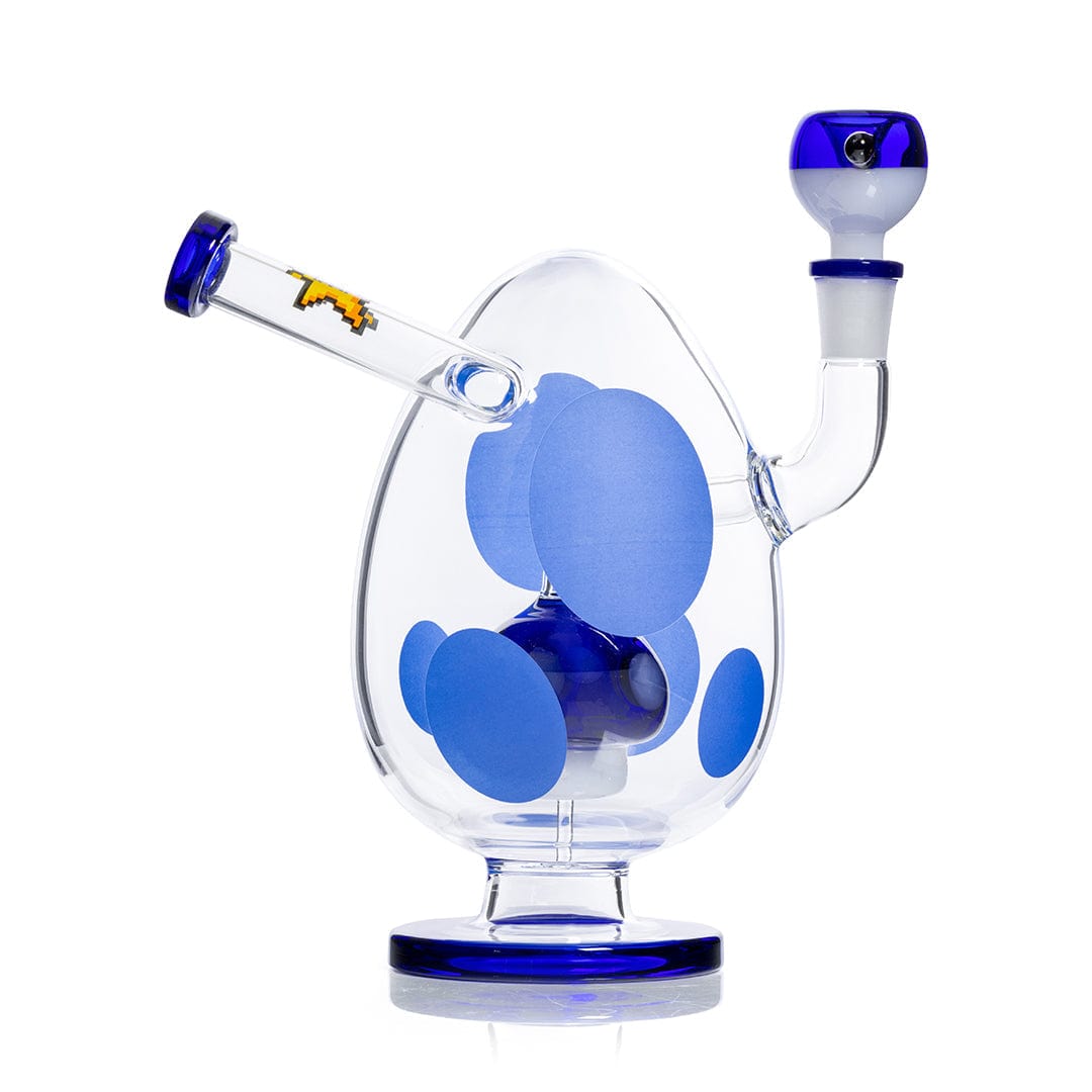 Angled studio shot of the Hemper Spotted Egg XL Bong with blue polka dots, blue-rimmed mouthpiece and base.