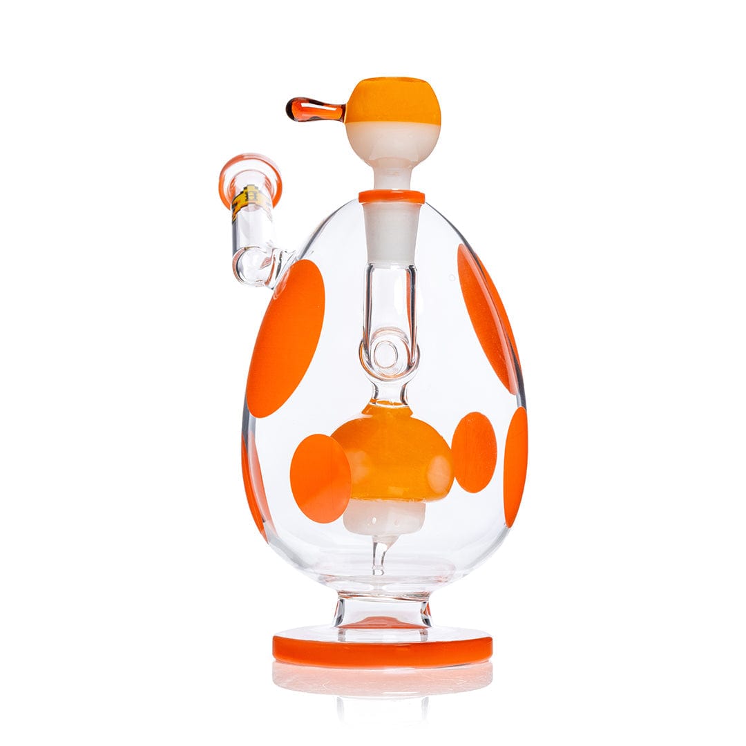 Front view of the Hemper Spotted Egg XL Bong showing a clear egg-shaped body with bright orange polka dots and matching orange accents.