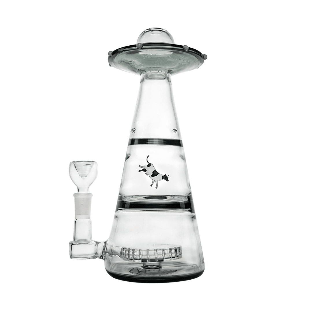 Front-facing shot of the clear Mothership XL Bong with a UFO-like top, black trim rings, and a small cow graphic on the cone body.