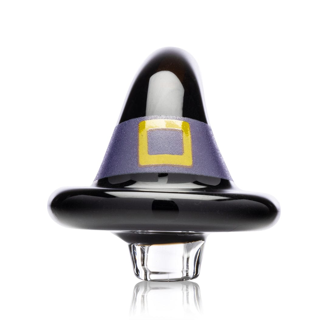 A close-up, angled view of the Witch's Hat Carb Cap, showcasing its dark, reflective surface and rounded shape.