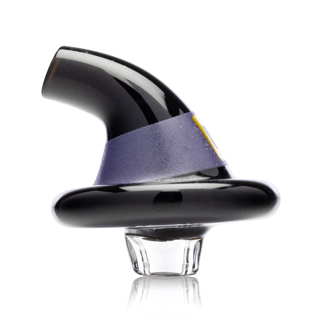 A studio shot displays the Witch's Hat Carb Cap with a glossy black finish, reflecting light against a neutral background.