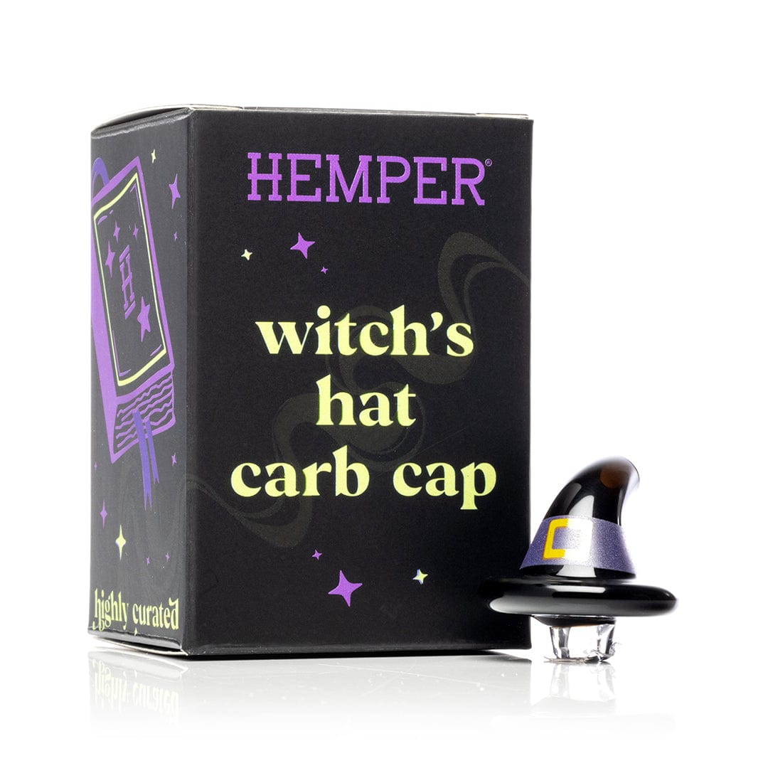 A close-up, angled view of the Witch's Hat Carb Cap, featuring a black, conical shape with a clear glass tip.