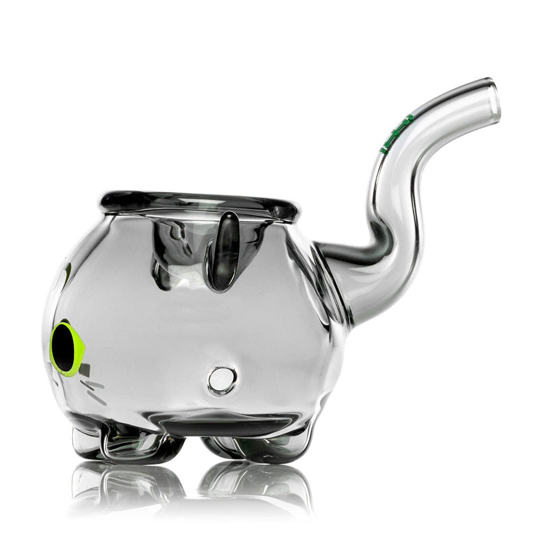 A side view of the Black Cat Handpipe 3" showcasing its dark, curved design reflected on a glossy surface.