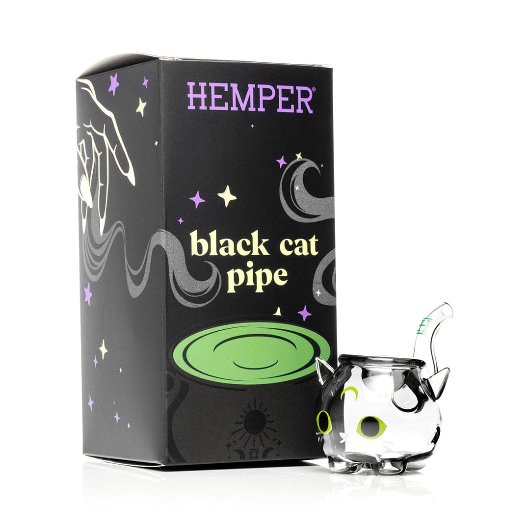 Front view of the Black Cat Handpipe 3", with a glossy black finish and slight curve, set against a sparkling dark background.