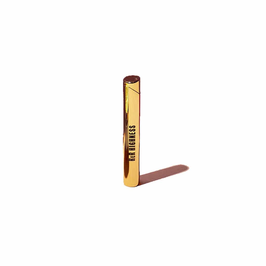 Front view of The De-Lighter, a gold-colored, minimalist lighter with a sleek design.