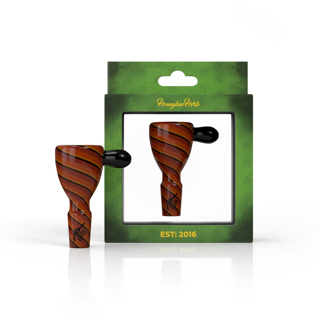 A close-up shot of the WIG WAG STRIPPED BONG BOWL PIECE, displaying its unique striped pattern against a dark backdrop.