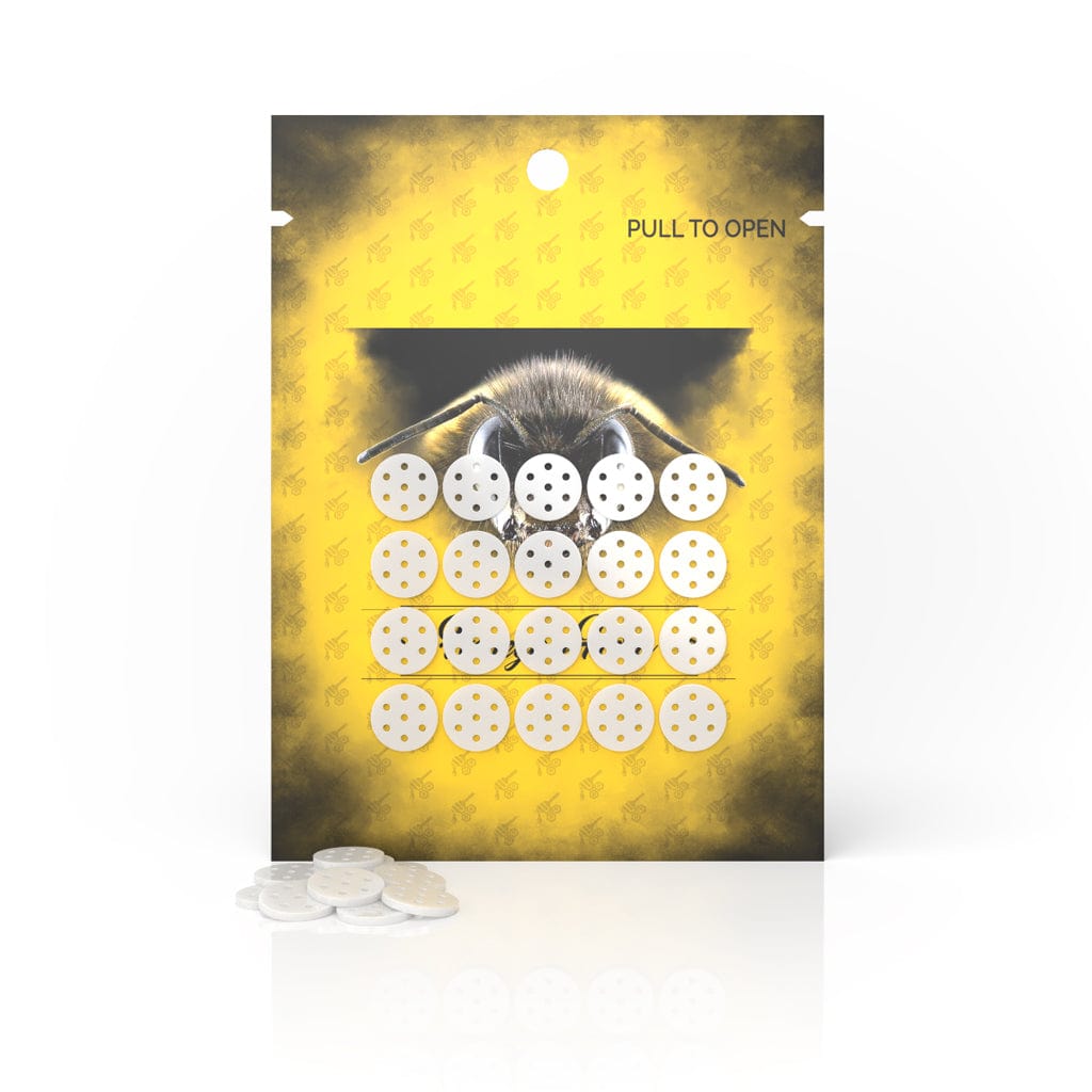 Yellow cannabis accessory pouch displaying a bee and filled with white pills or tablets.