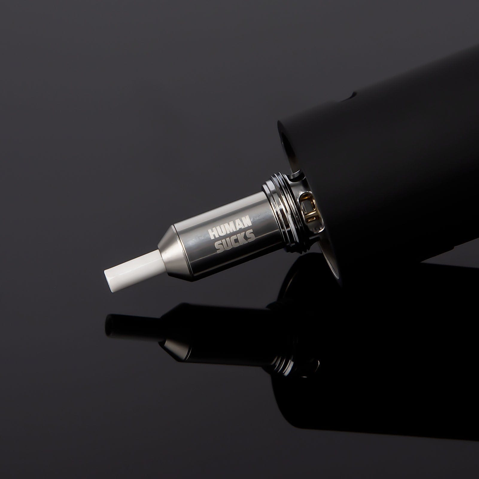 A close-up, angled view of the STINGER 2 Tip, showcasing its sleek, metallic finish against a dark background.