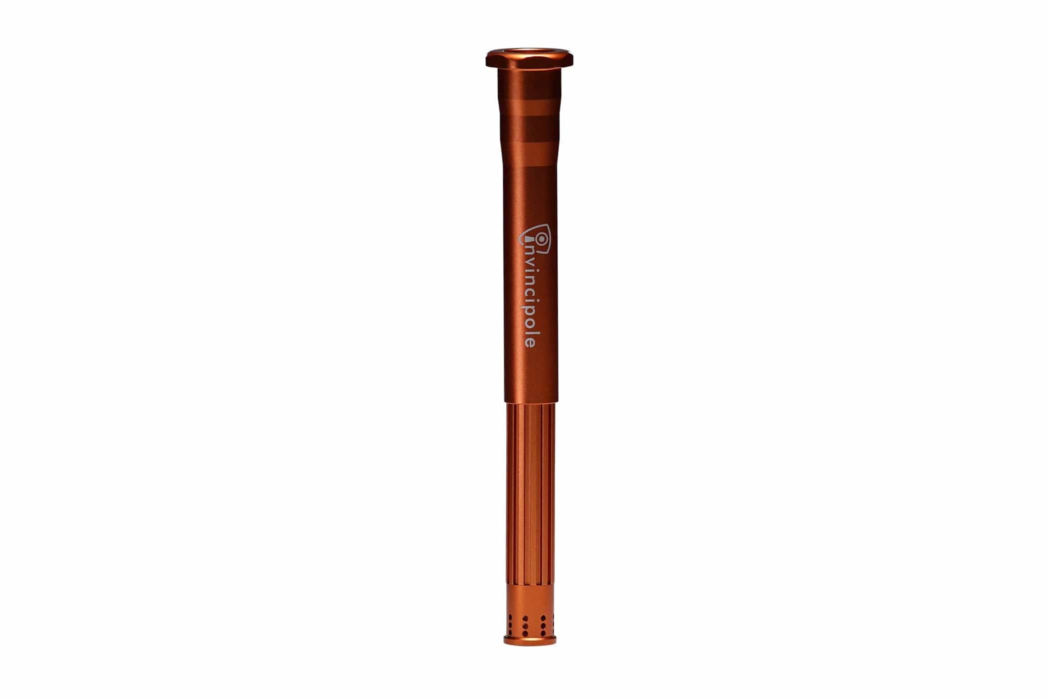 Centered vertical close-up of the orange Invincipole Infinity shaft showing its fluted lower section and smooth upper tube with logo.