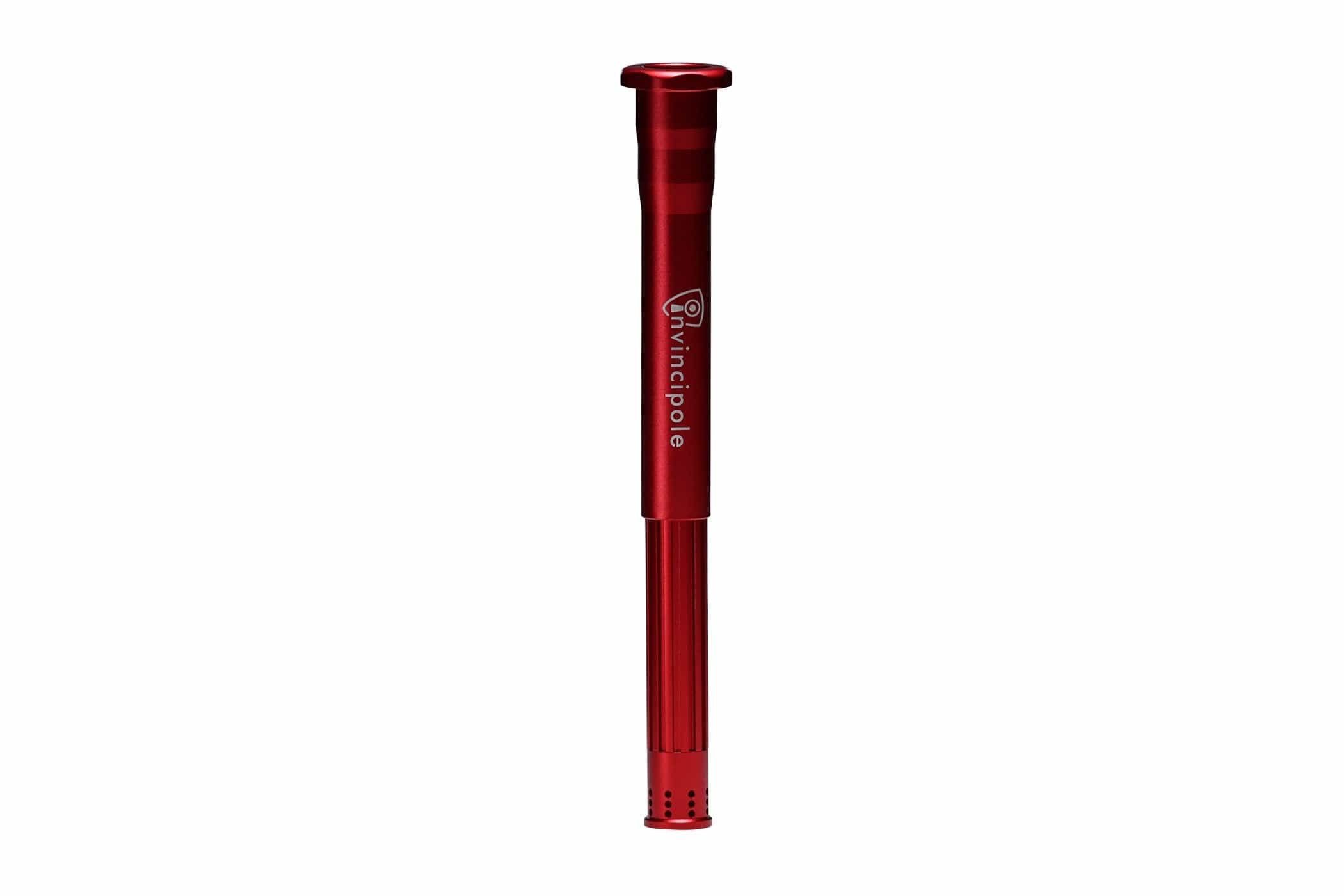 Top-centered close-up of the red Invincipole Infinity pole shaft showing its glossy finish, engraved logo, and fluted lower section.