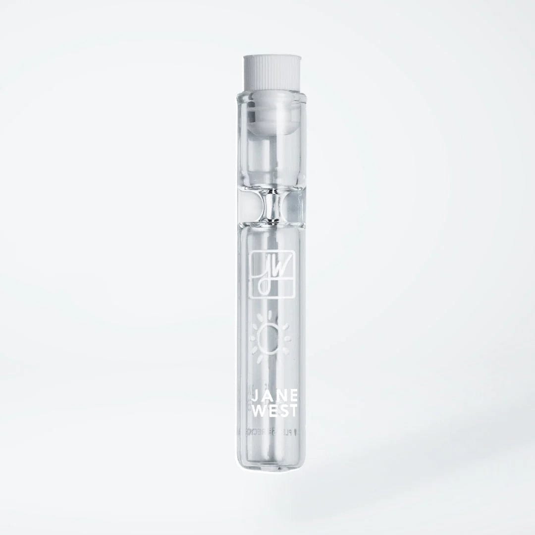 A close-up, angled view of the Jane West Travel Pipe, showcasing its sleek, portable design against a white background.