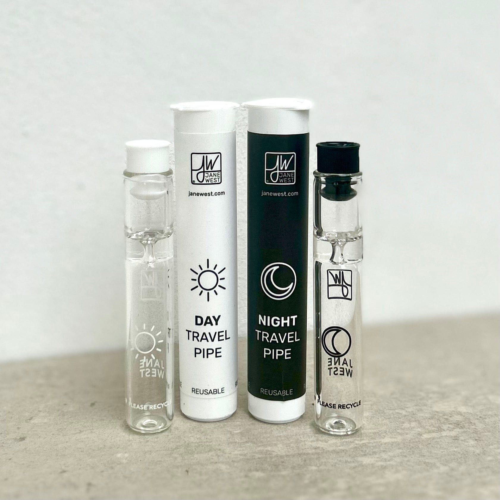 Front view of the Day & Night Travel Pipe Set, displaying the product’s logo on a white background.