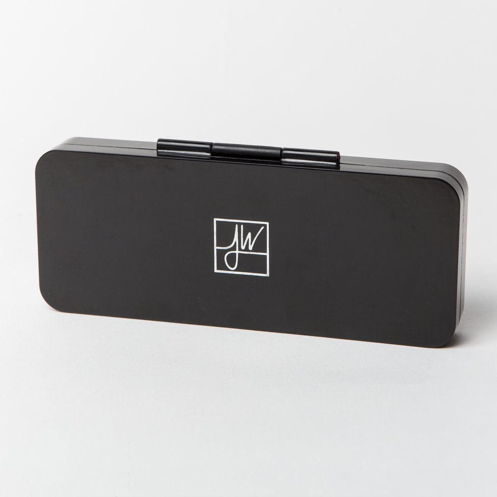 Front-facing view of the black Jane West The Compact rectangular case with rounded corners and a white JW logo centered on a plain light background.