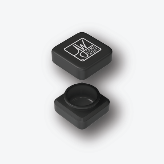 A centered, angled shot of The Cube, a minimalist, geometric solid with a smooth, matte finish.