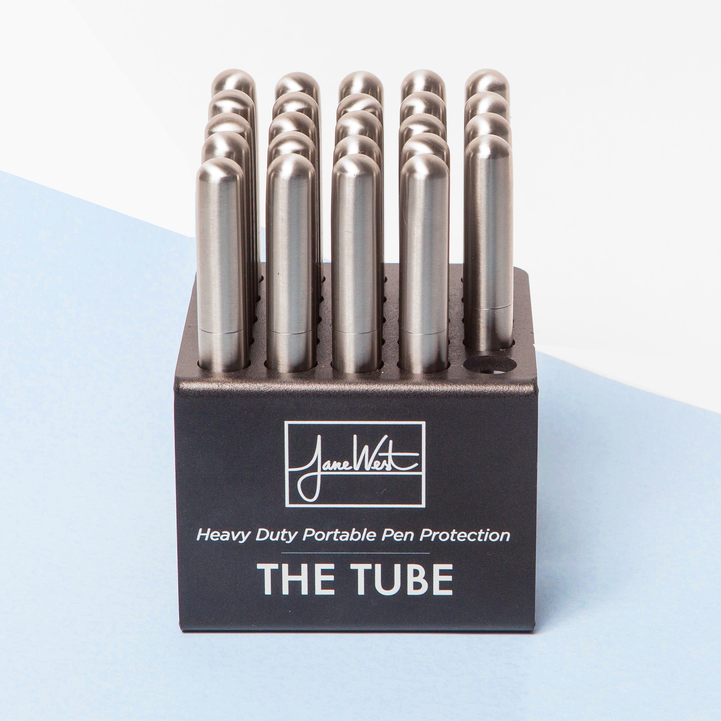 Front view of The Tube, a sleek, cylindrical glass piece with a minimalist design and a smooth, polished surface.