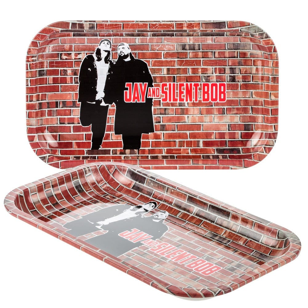 Top-down and angled views of the Jay and Silent Bob Wall Rolling Tray showing a brick-wall print with black silhouettes of the two characters and red logo text.