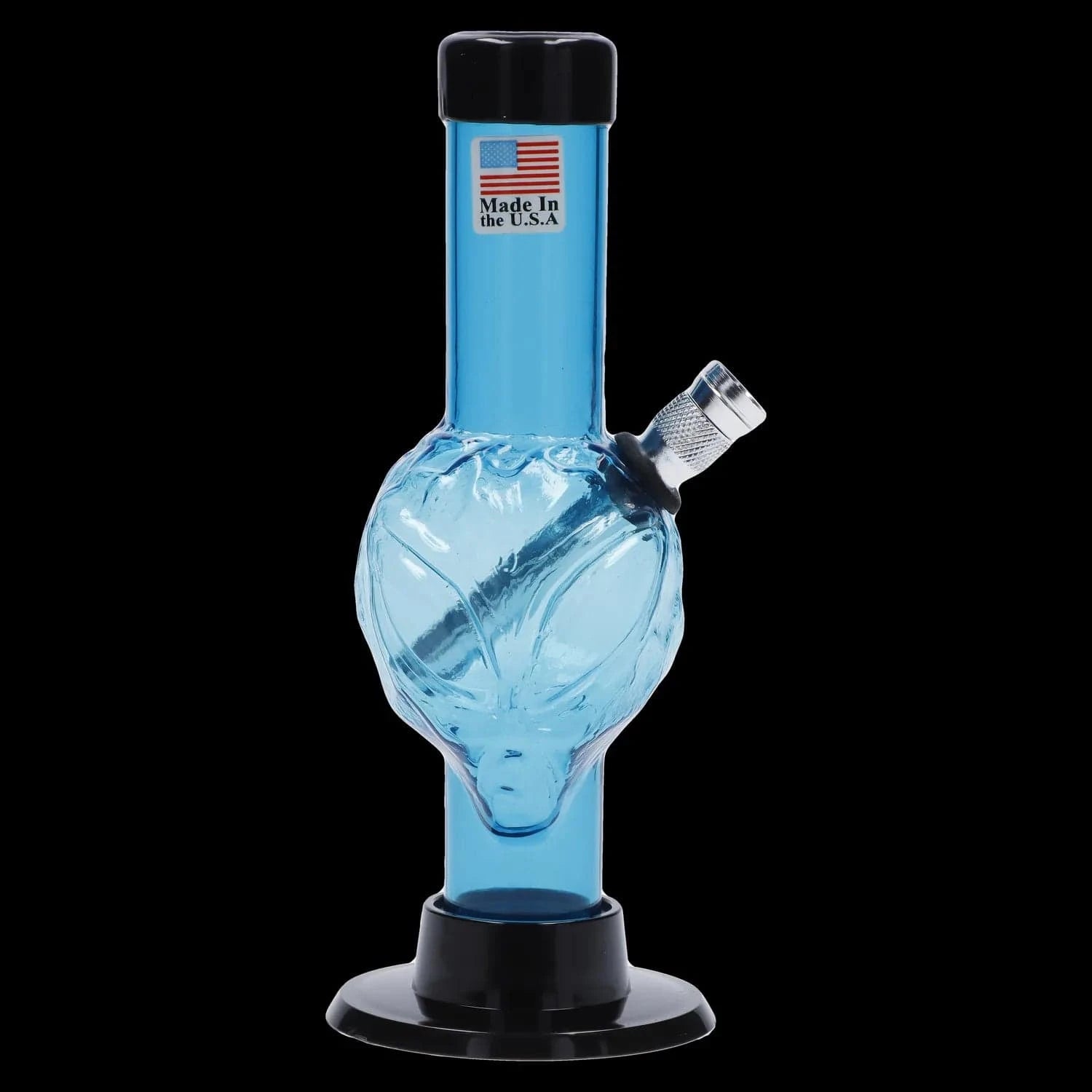Center-front view of a light green JM Plastics Mini Alien Base Acrylic Bong - 6 in. against a black background, showing its textured alien-head chamber, angled metal bowl, and black flared base.
