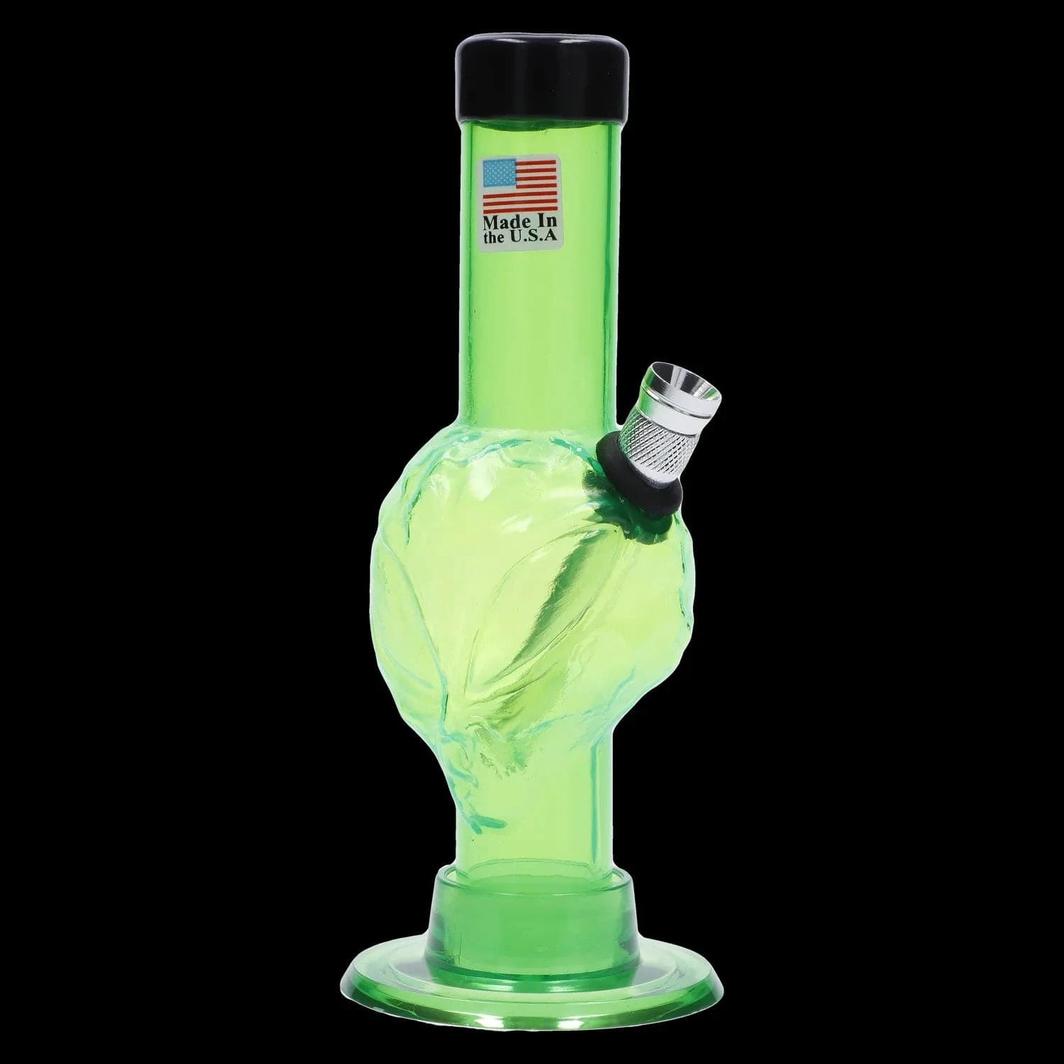 Front view of the JM Plastics Mini Alien Base Acrylic Bong - 6 in. in translucent light green against a black background, showing its bulbous alien-head chamber, angled metal bowl, and black-rimmed mouthpiece.