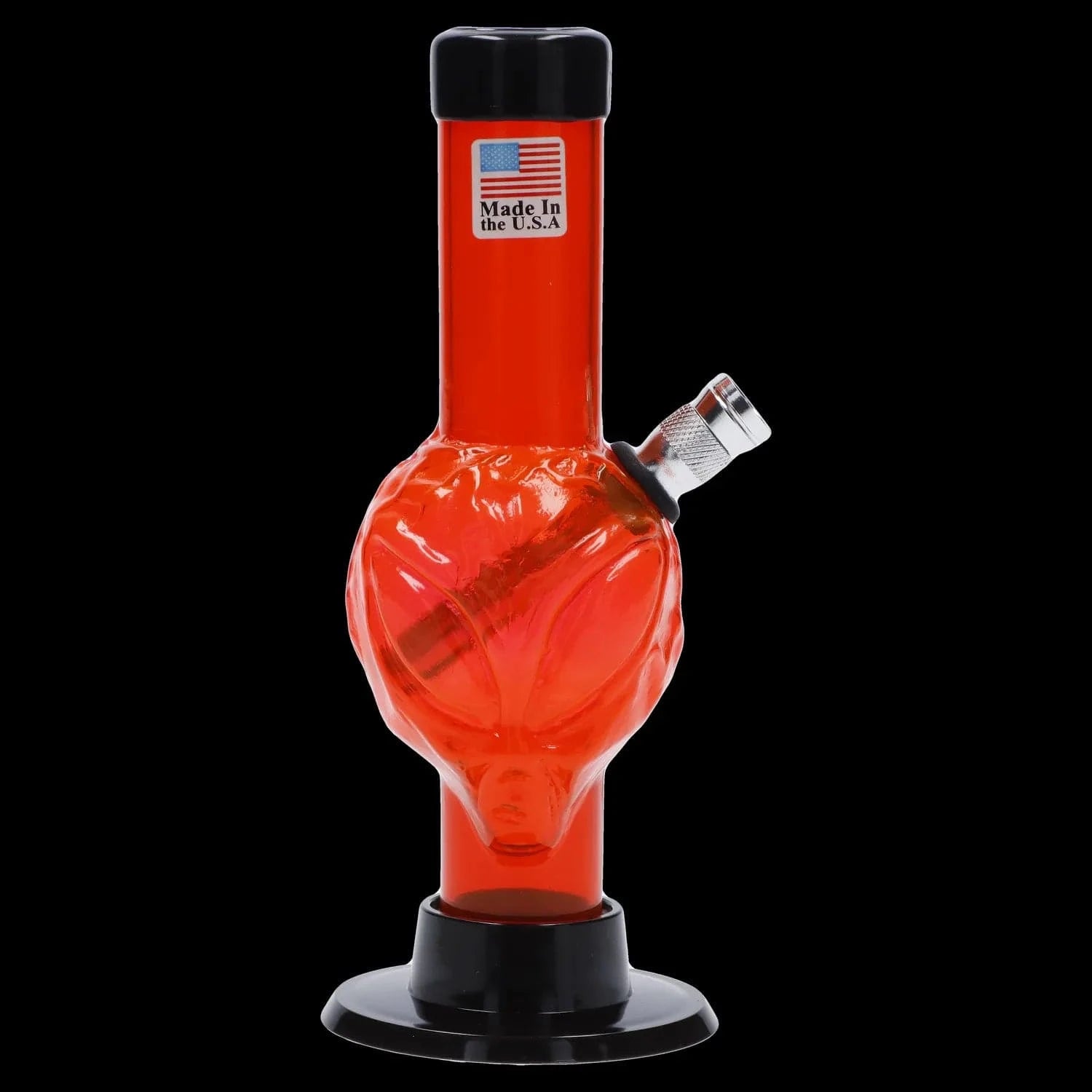 Close-up front view of the JM Plastics Mini Alien Base Acrylic Bong - 6 in., showing a red alien-shaped body and angled metal bowl against a black background.