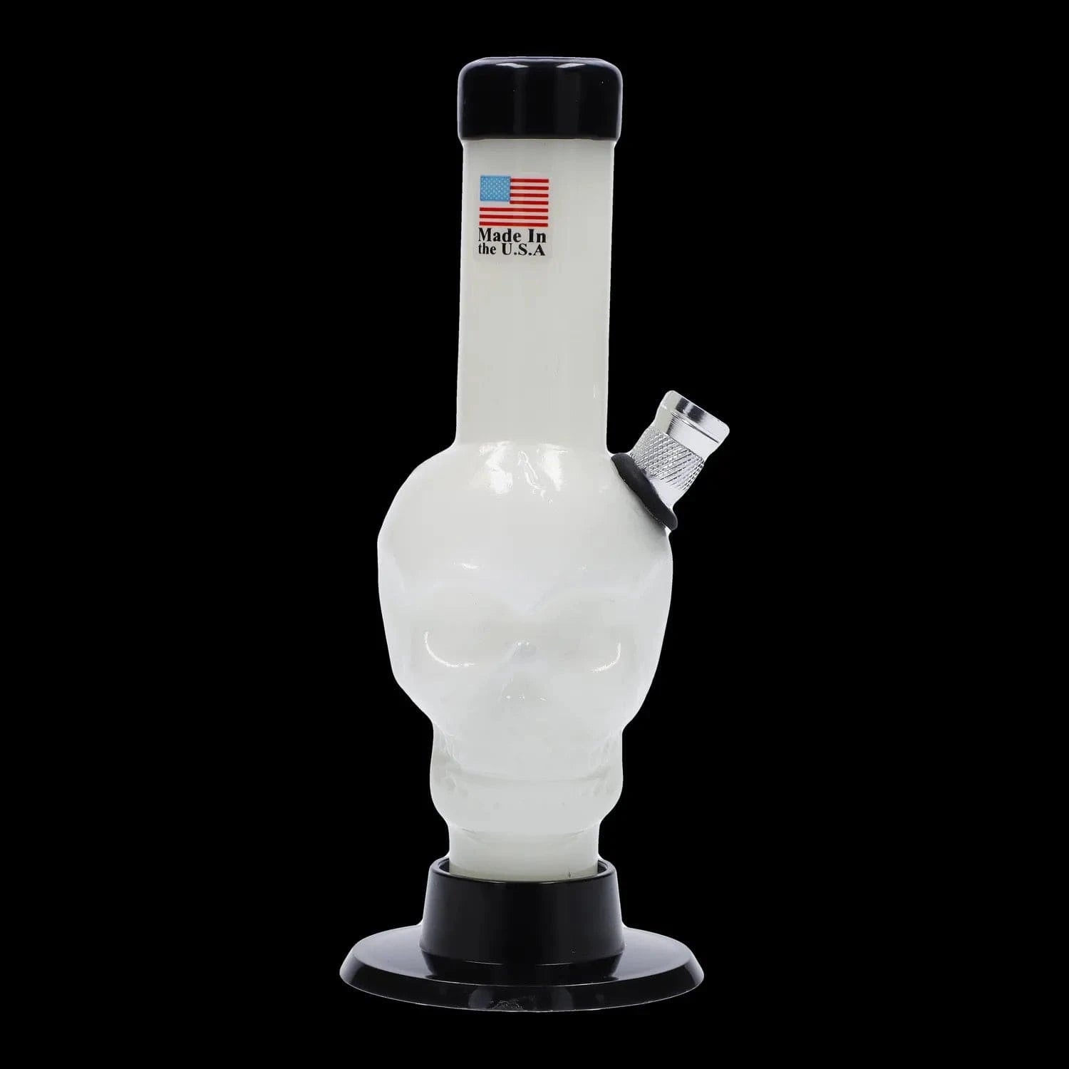 Centered front view of the JM Plastics Mini Skull Base Acrylic Bong - 6 in., showing a white skull neck with a dark green rim and angled metal bowl against a black background