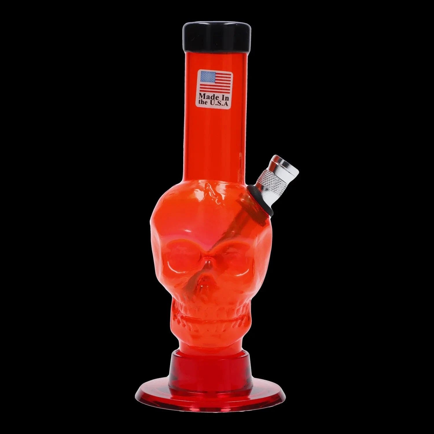 Close-up front view of the red JM Plastics Mini Skull Base Acrylic Bong - 6 in. showing a skull-shaped body, angled metal bowl, and black background