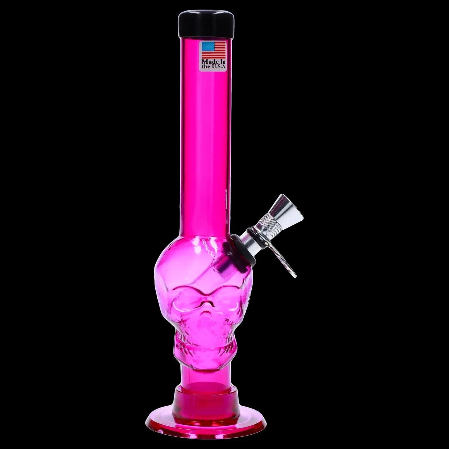 Vertical close-up of the bright pink JM Plastics Skull Base with Pull Slide Acrylic Bong - 8 in., shown head-on against a black background highlighting the skull-shaped chamber and metal pull slide.