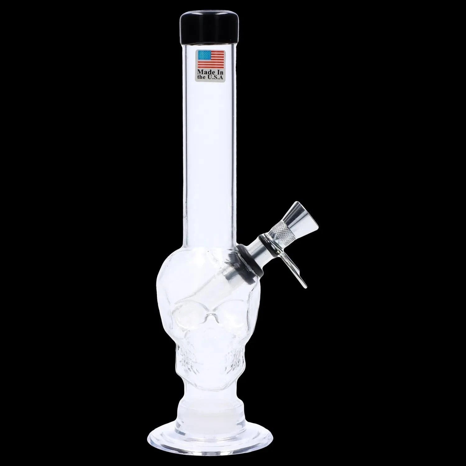 Centered, front view of the JM Plastics Skull Base with Pull Slide Acrylic Bong - 8 in., lit to show its clear skull-shaped body and angled metal pull slide against a black background