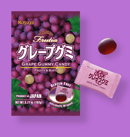 Front view of the Japanese Grape Gummy candy packaging, showcasing bold text and fruit illustrations on a vibrant purple background.