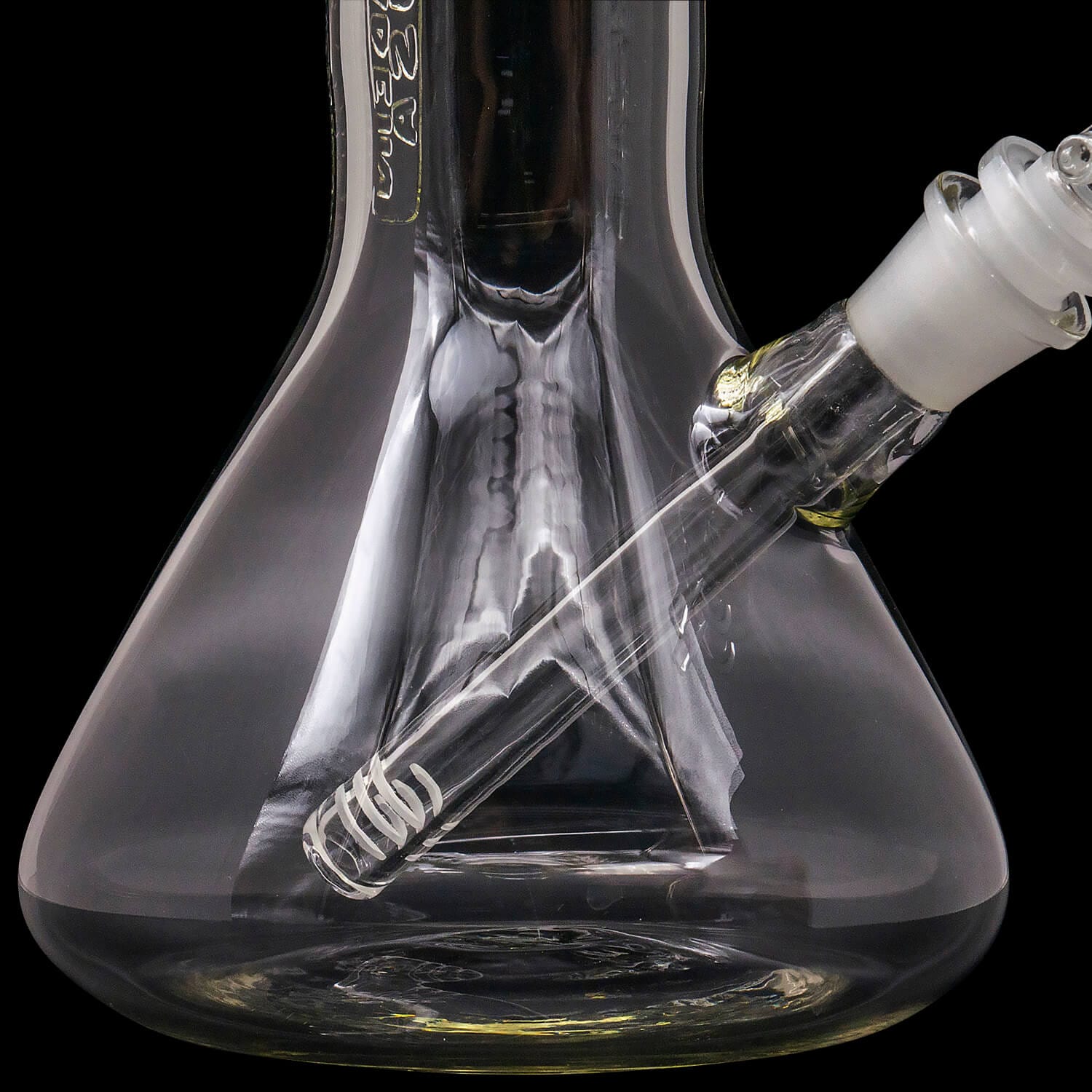 Close-up front view of the clear "Magnum Flow" Thick Glass Beaker Showerhead Perc Bong showing the angled downstem and beaker base against a black background