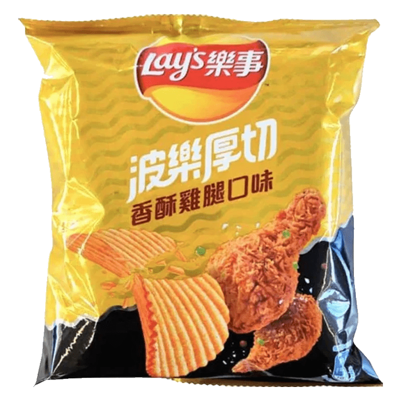 A close-up, angled view of Lay’s Chips - Crispy Fried Chicken, showing the ridged, golden-brown chips against a dark background.