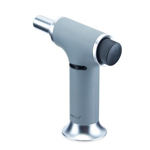 A close-up, angled view of the Turbo Butane Torch Lighter featuring a silver metallic body and black grip.