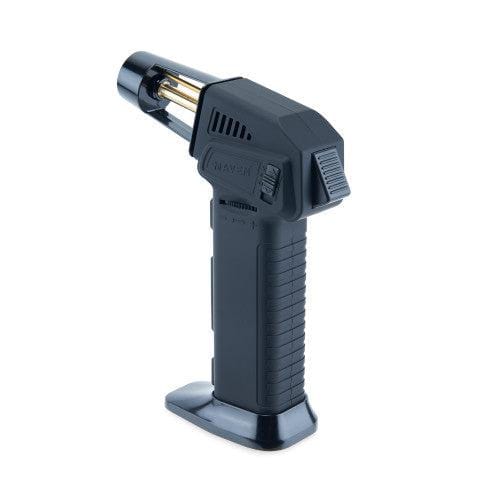 A close-up shows the black Volt Butane Torch Lighter with Dab Tool angled slightly upwards, revealing its metallic nozzle and textured grip.