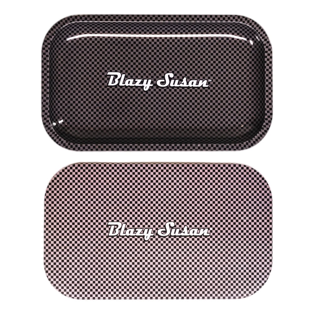 Top-down view of two Pink Blazy Susan Metal Rolling Tray pieces with a small black-and-pink checkerboard pattern and white "Blazy Susan" script centered on each.