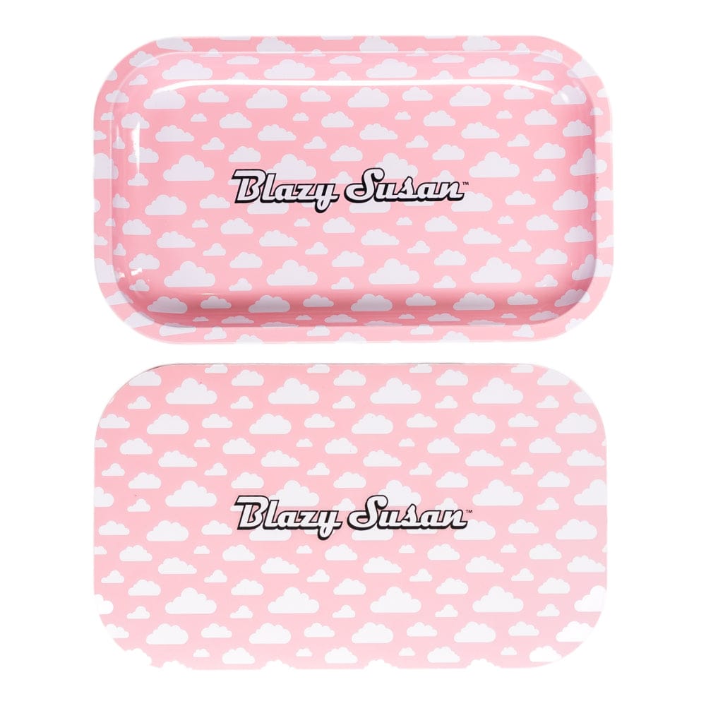Top-down view of two matching pink cloud-patterned Blazy Susan Metal Rolling Tray pieces, the lid above the tray both showing the centered Blazy Susan logo.